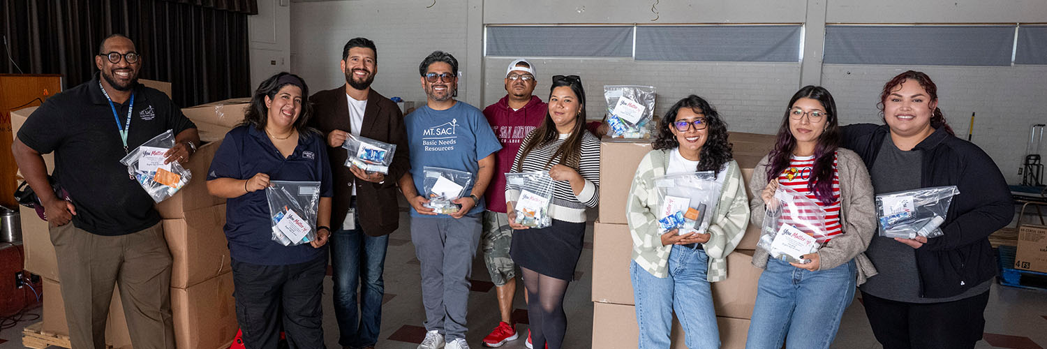 United Way and Mt. SAC staff are joined by students to celebrate the donation