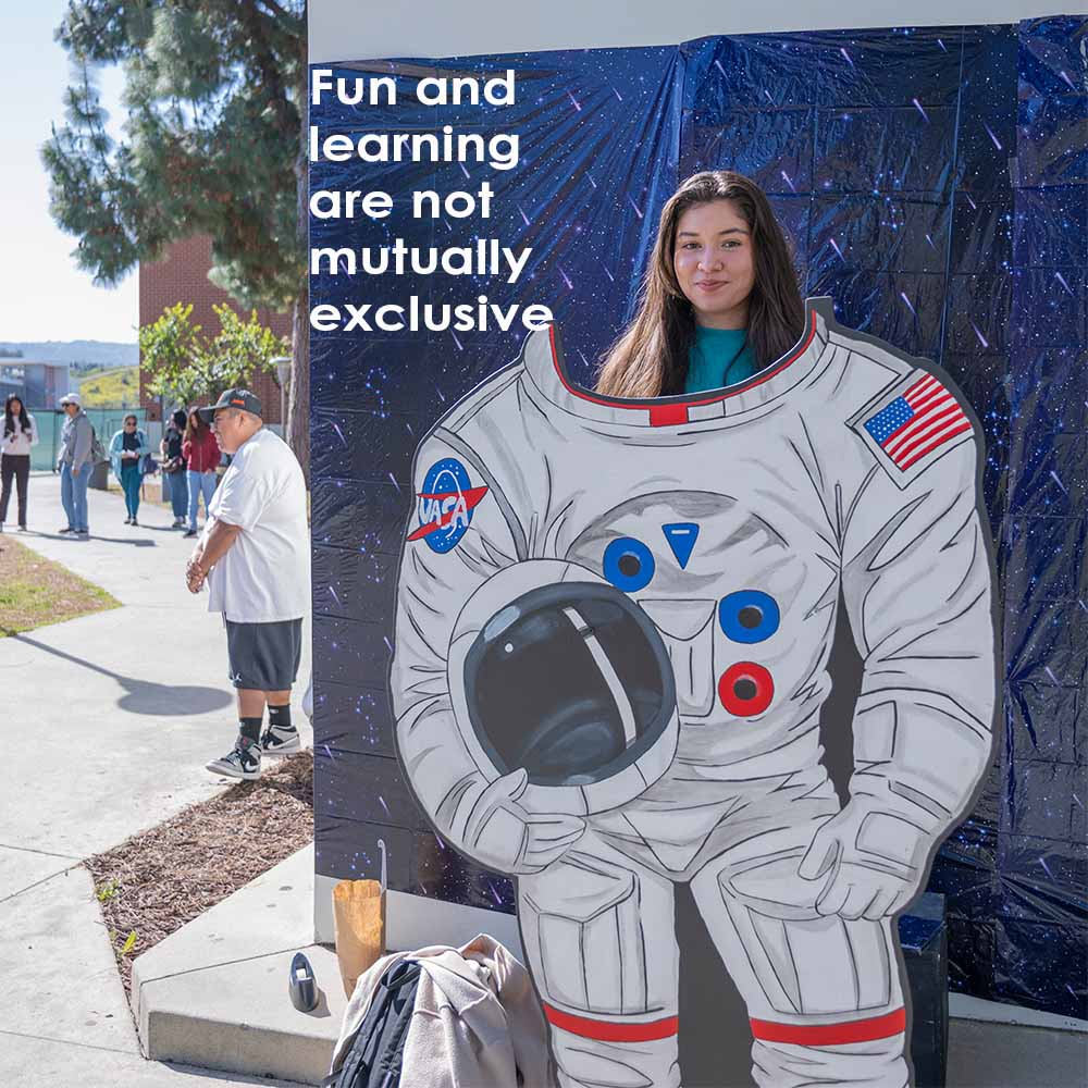 "Fun and learning are not mutually exclusive" - student poses in NASA backdrop