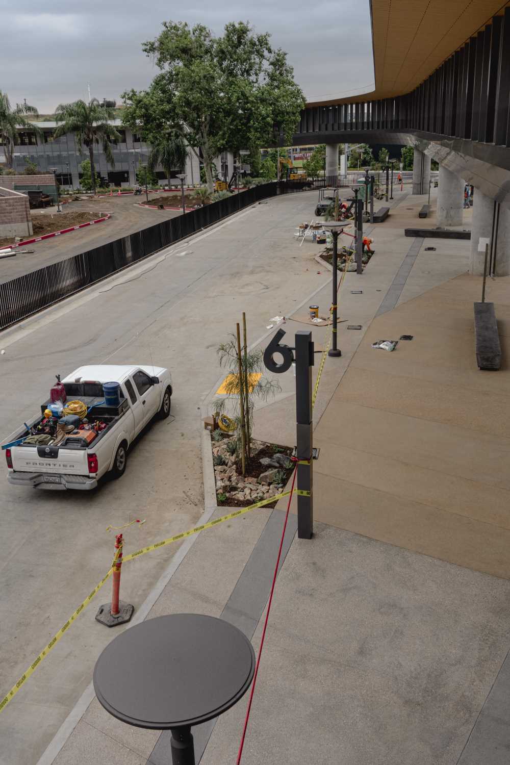 Near-complete Transit Center showing bays, with Pedestrian Bridge crossing over