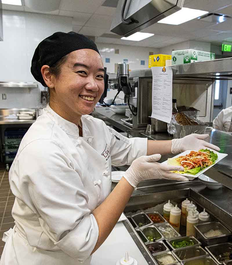 Jenny displays meal she cooked