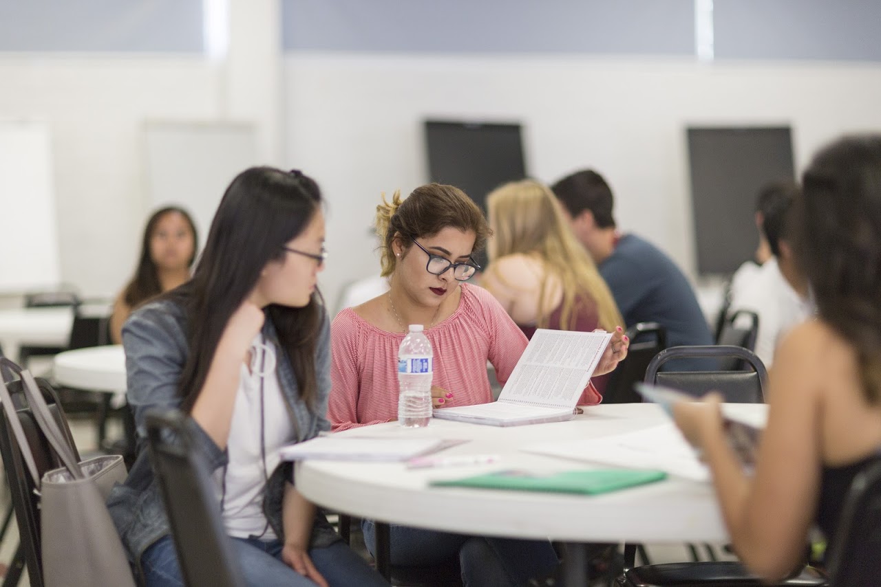 Two students sitting at a table 