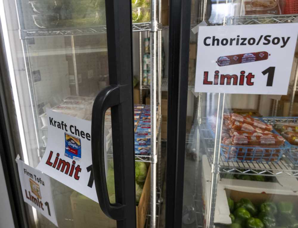 Cooler with signs saying "Limit 1"