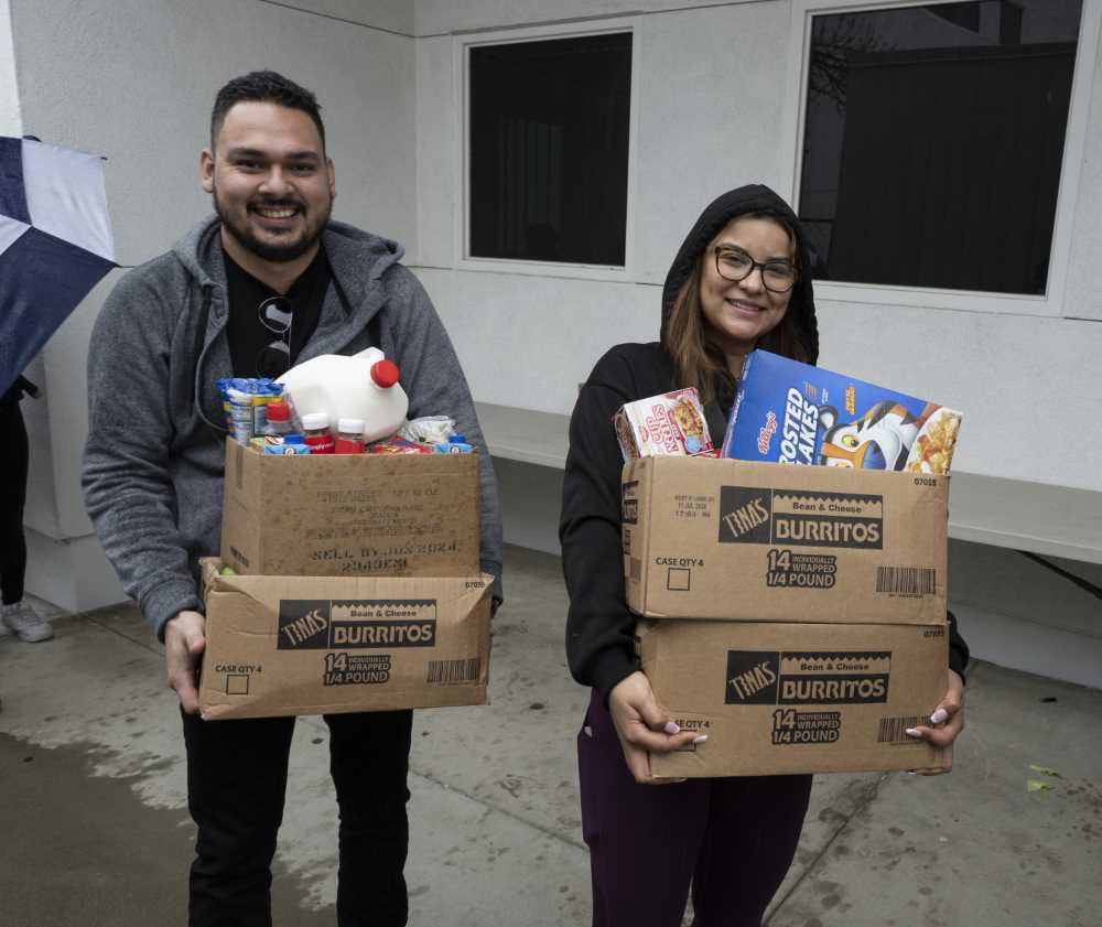 Students boxed their own groceries and are taking it home