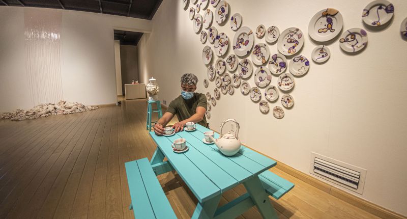 Reynoso places pieces of 'Pathogen Playground'