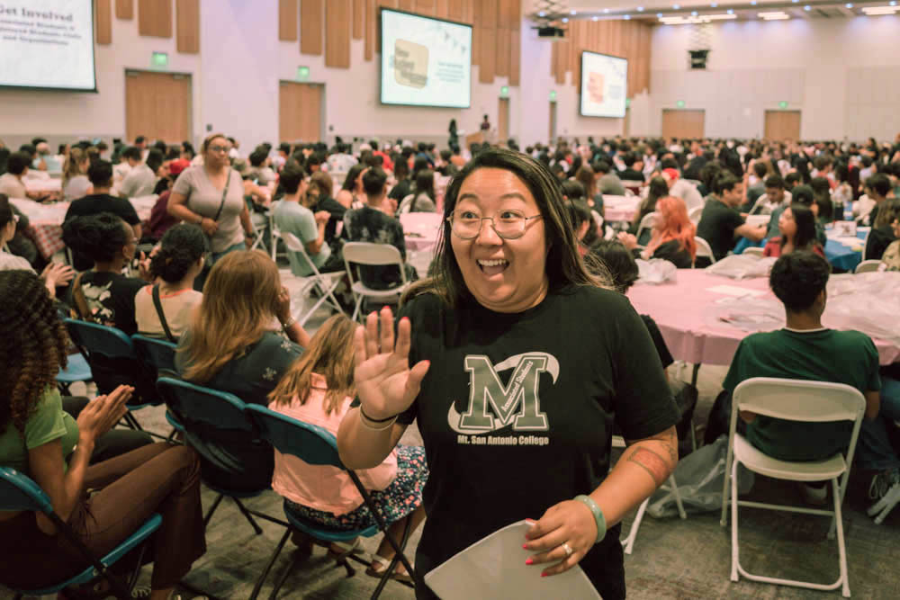 Students are greeted into the event