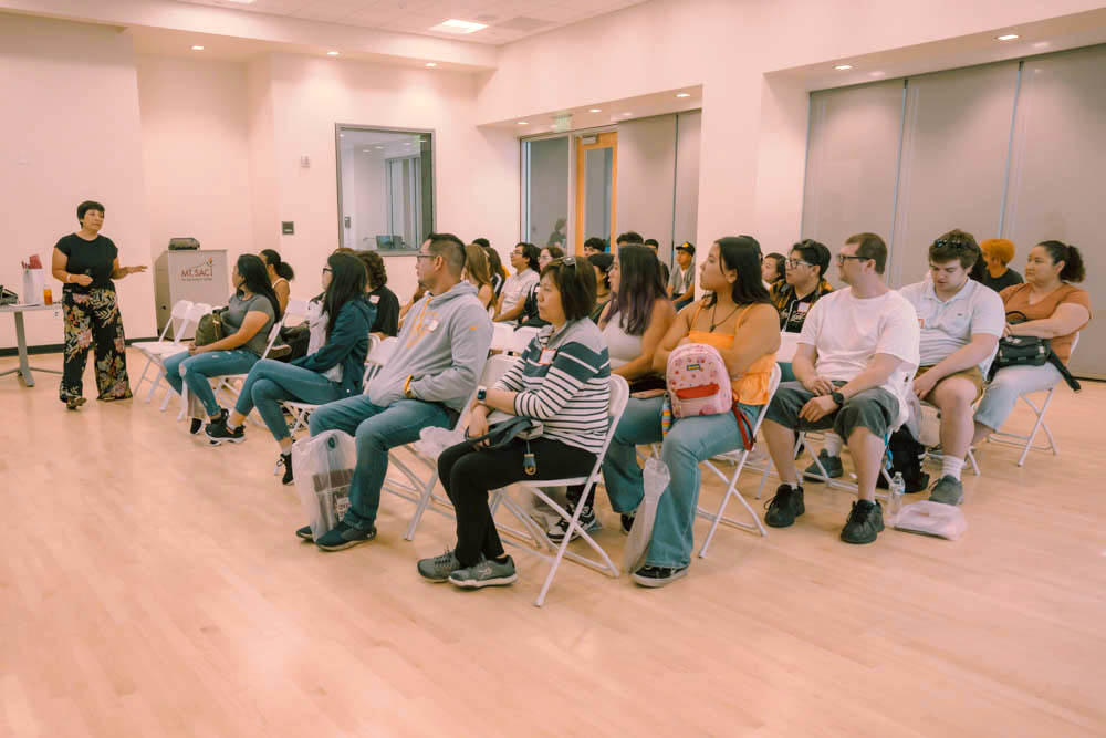 Students listen to a professor