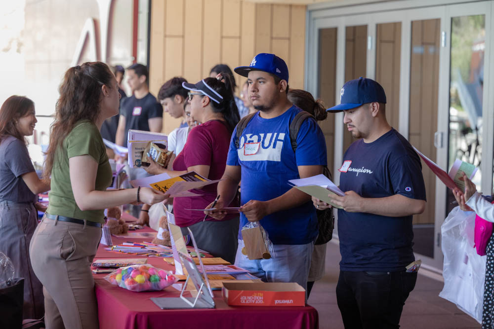 Students seek infomration at resource fair. 