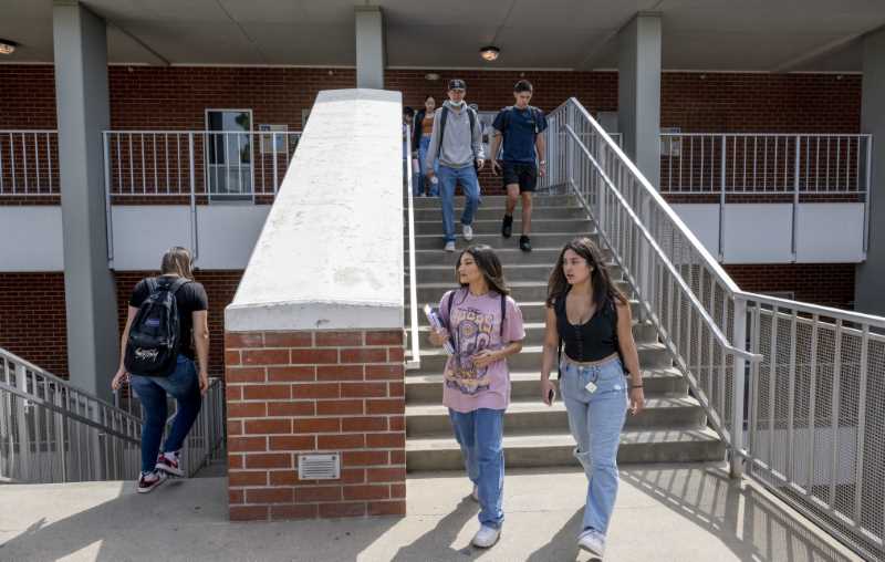 Students on stairs going to class