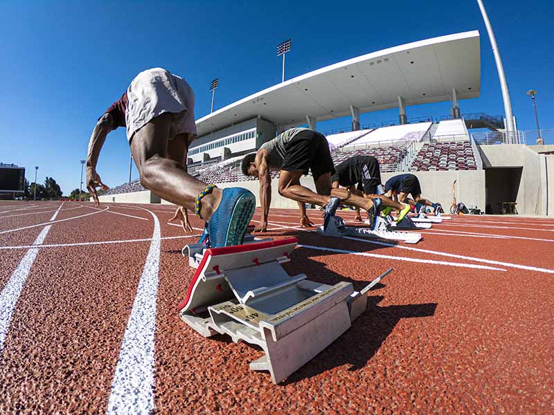 Runners practice at Hilmer Lodge Stadium