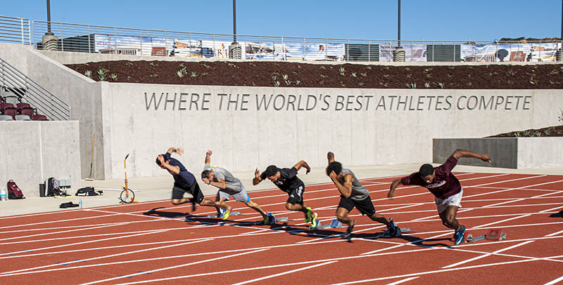 Runners practice at Hilmer Lodge stadium