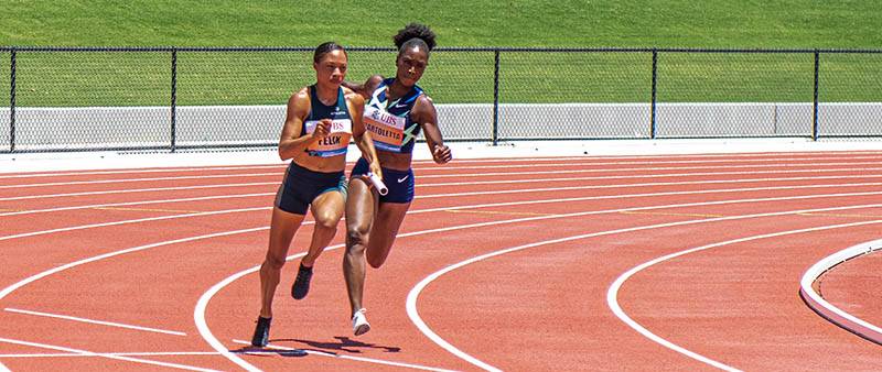 Allyson Felix runs the relay