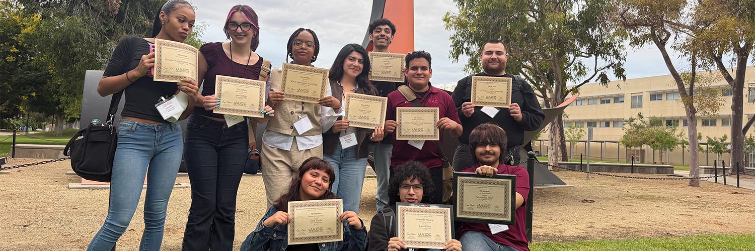 Students holding awards