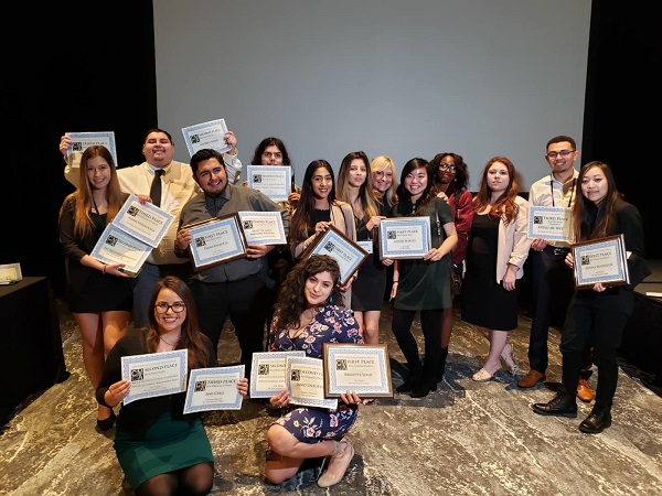 Students holding awards