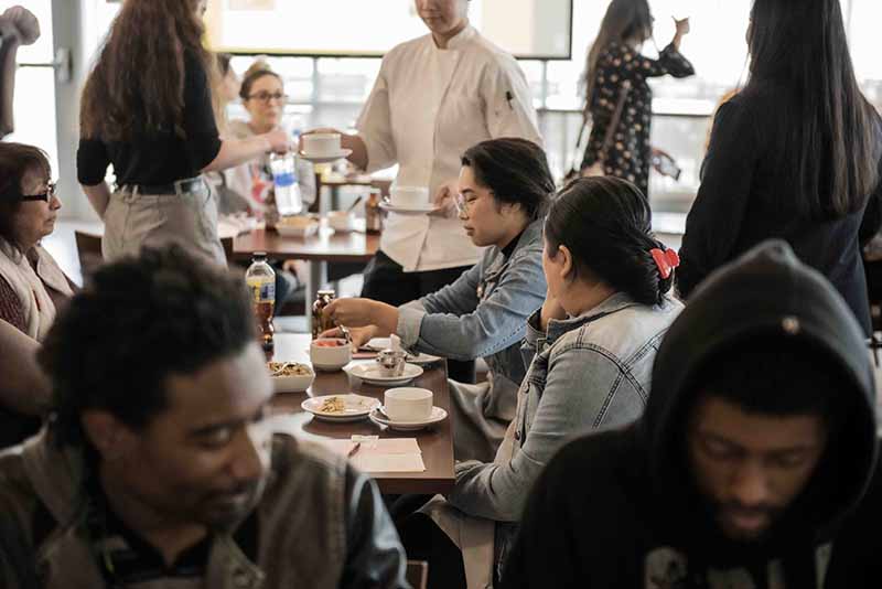 Student guests enjoy the meal