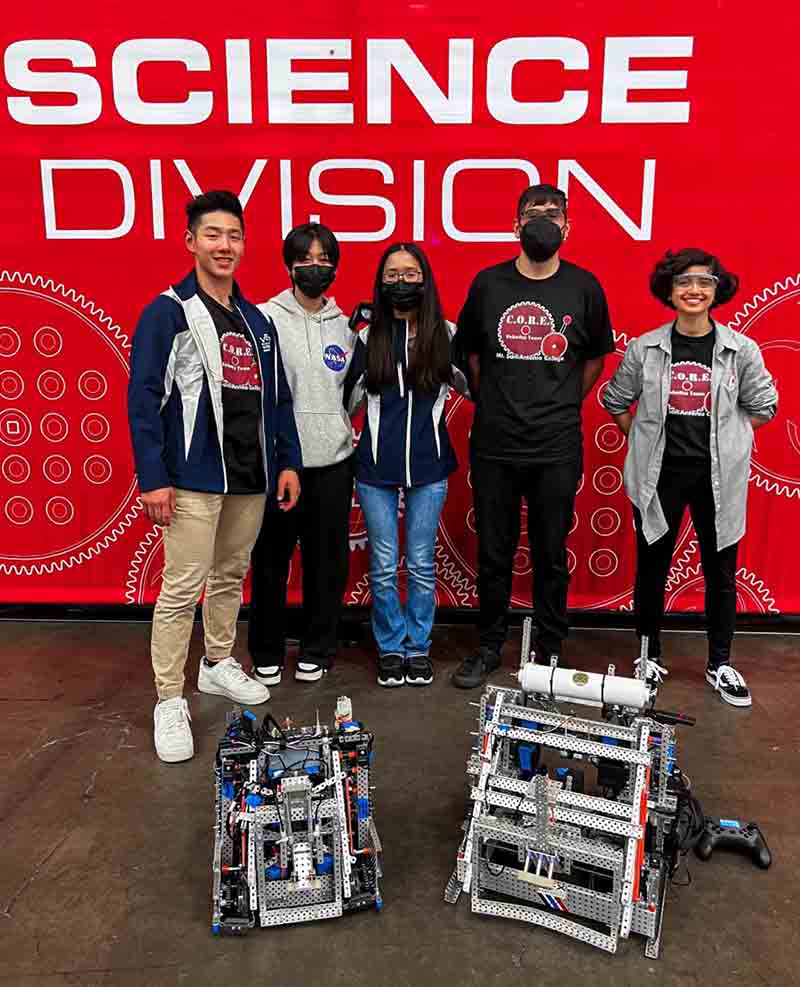 Nate (far left) with Robotics team