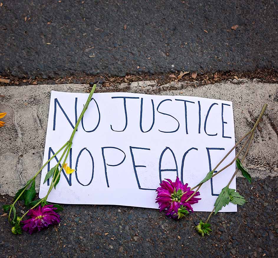 No Justice No Peace sign on ground