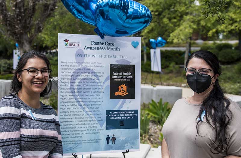 students with REACH Interpretive sign