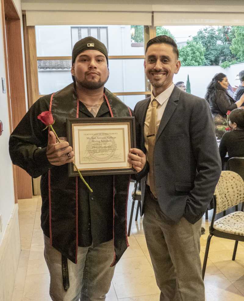 Rising Scholar with professor and certificate