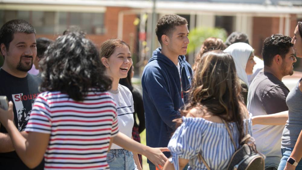 Students smiling at orientation