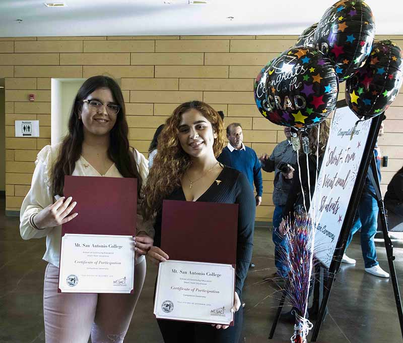 Students with their certificates