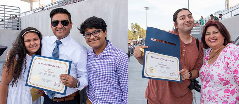 Students, friends and family hold up their "Outstanding Transfer Scholar" certificates.