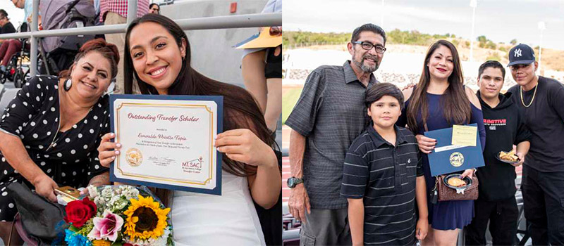 Students, friends and family hold up their "Outstanding Transfer Scholar" certificates.