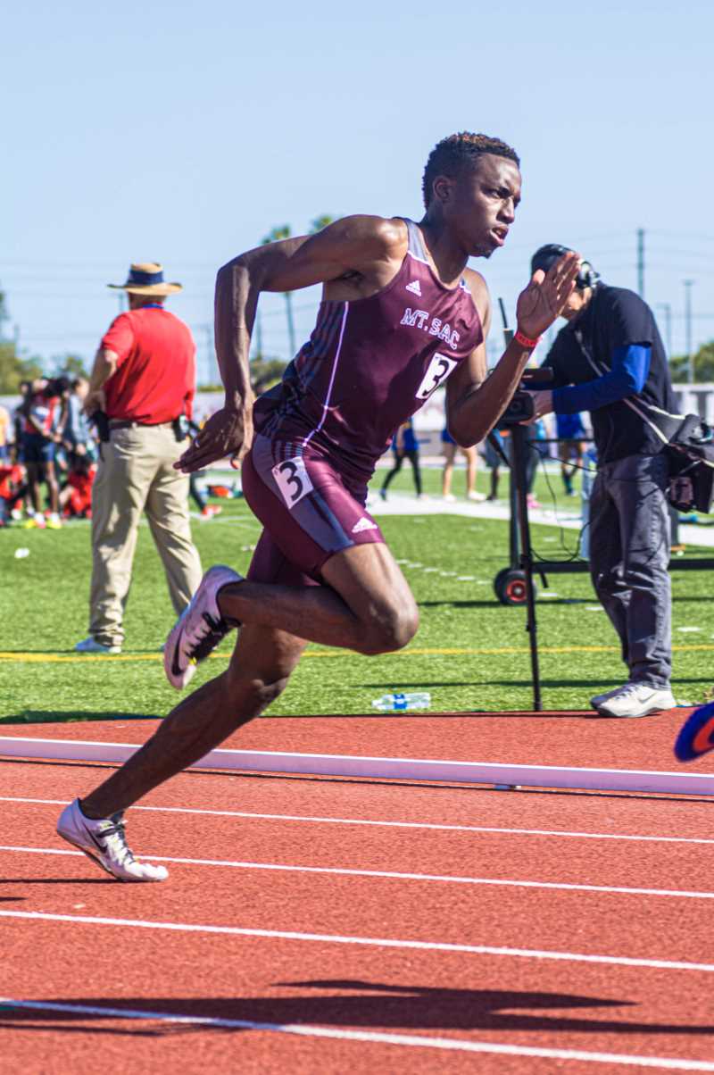 Male Mountie runner mid stride - courtesy of Mt. SAC Relays Photographer 