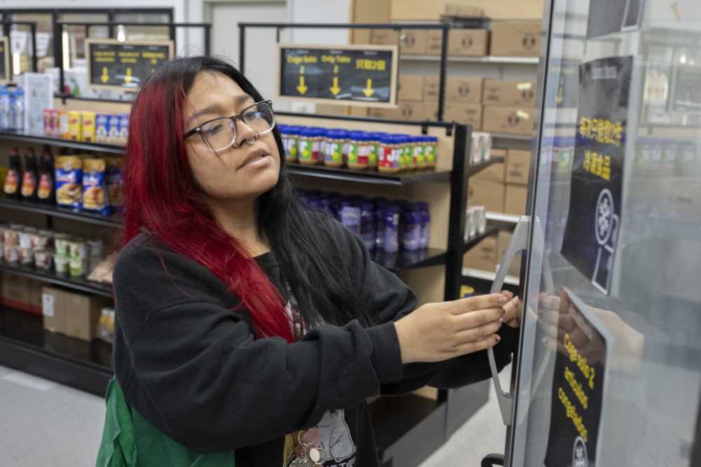 Student opens the freezer