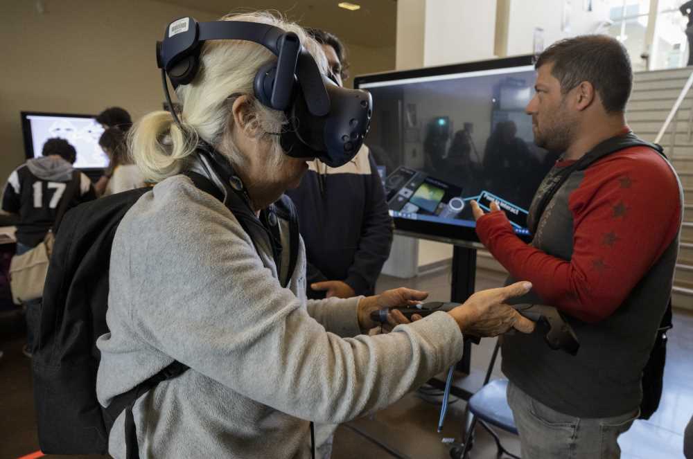 Woman uses a VR setup
