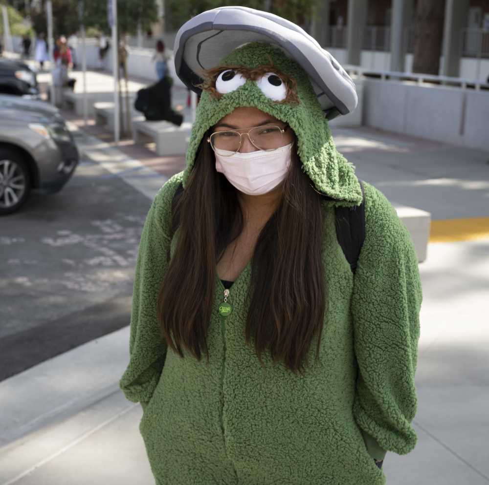 Student in costume as Oscar the Grouch