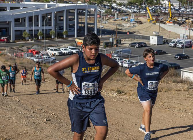 Cross Country runners mount grueling hill climb