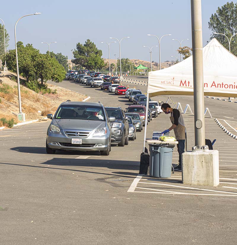 line of cars wait for meal