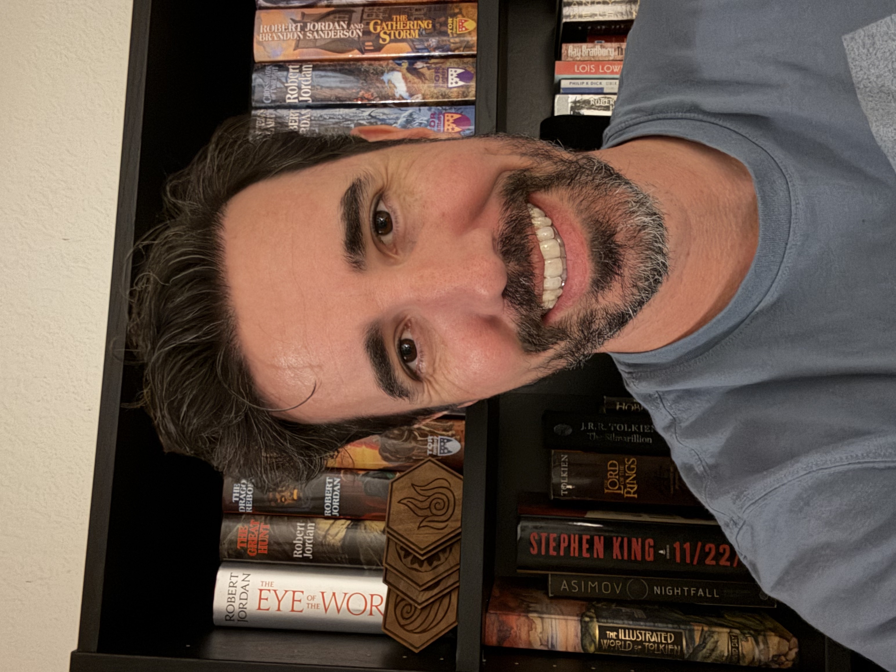 Prof. Saller in front of a bookcase